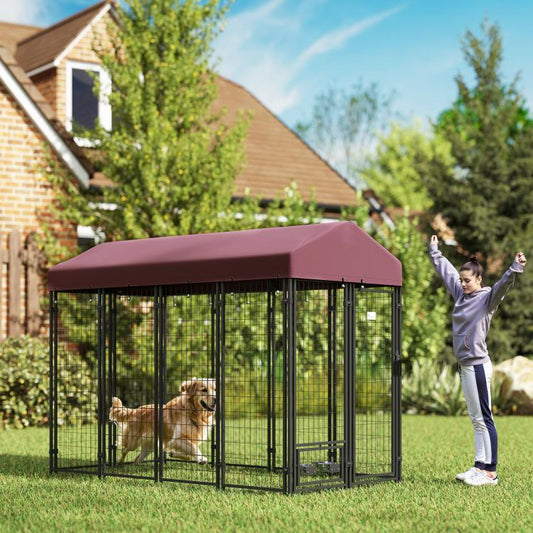 Red outdoor dog kennel with waterproof canopy, large run with dog inside