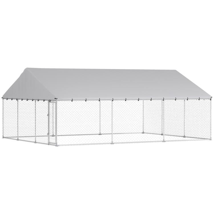Rectangular outdoor chain-link dog kennel with gray frame and covered roof