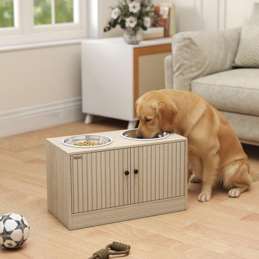 Raised dog feeding cabinet with two bowls; golden retriever eating from front bowl