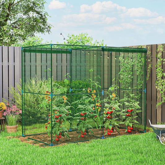 Green walk-in plant protector cage with mesh walls in a backyard garden