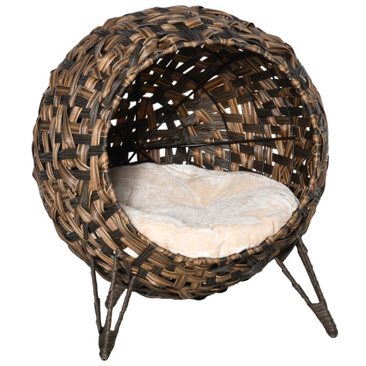 Round woven cat bed with dark brown basket weave and beige cushion