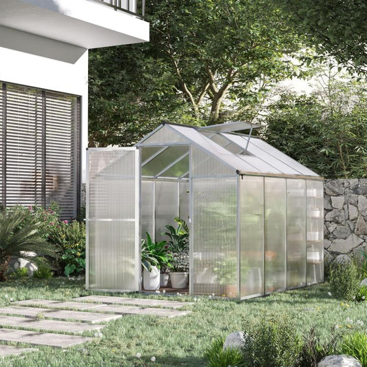 Clear polycarbonate walk-in greenhouse with metal frame and roof vent