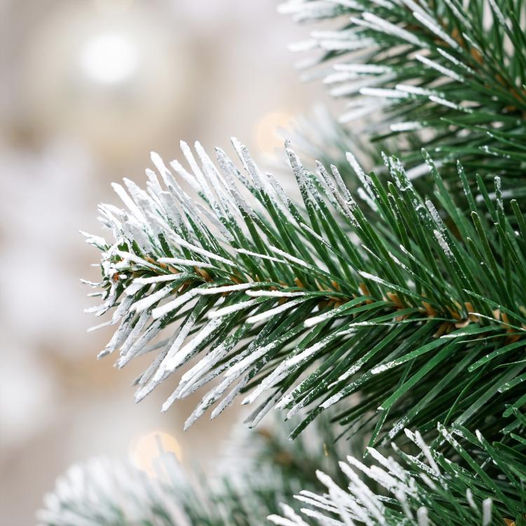 Artificial Christmas tree needles with frosted tips and green branches