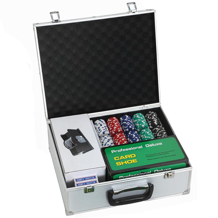 Poker chip set aluminum case open with stacked chips and card shuffler