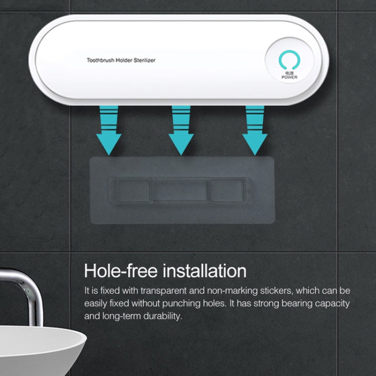 White wall-mounted toothbrush sanitizer with power icon and no-drill installation design