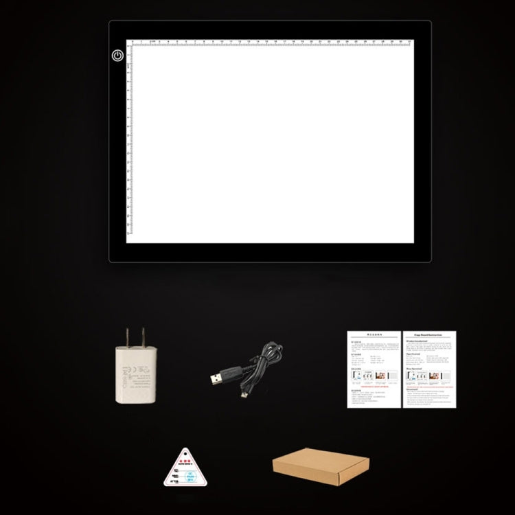 A4 LED tracing light pad kit contents with USB cable and instruction cards