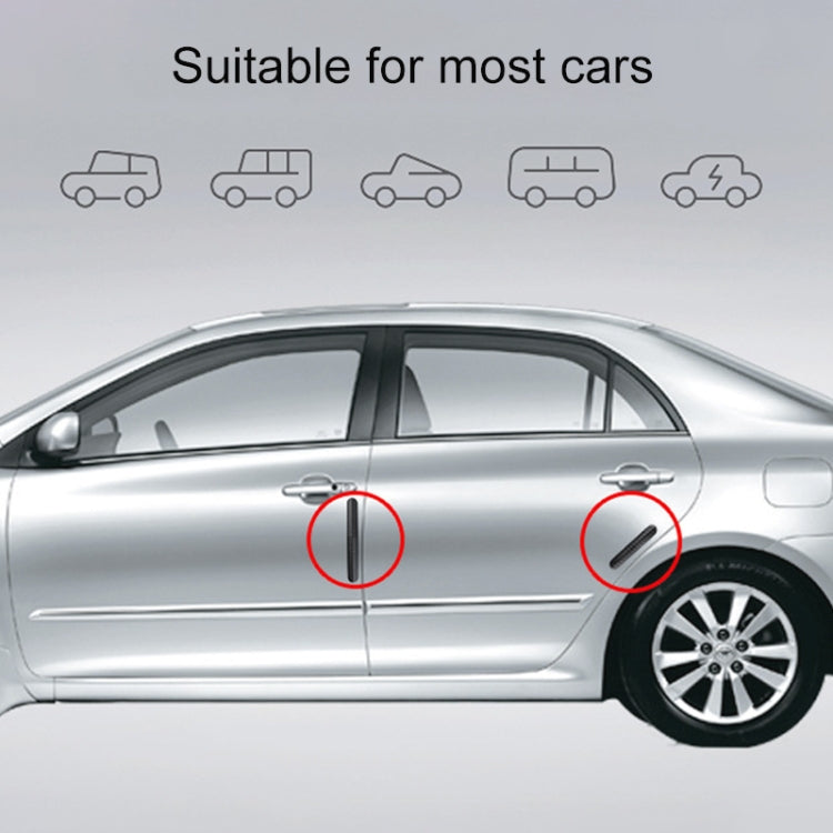 Two carbon fiber anti-collision strips on car door panels