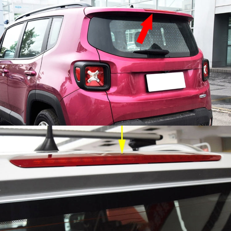 Red high-mount brake light installed on SUV rear hatch area