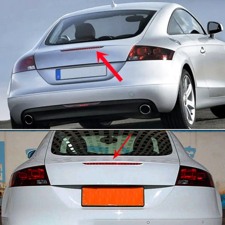 Rear high position brake light installed on car hatch, with arrows pointing to the light.