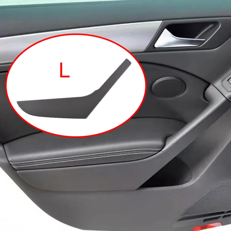 Left inner door handle cover on door panel, dark gray plastic trim