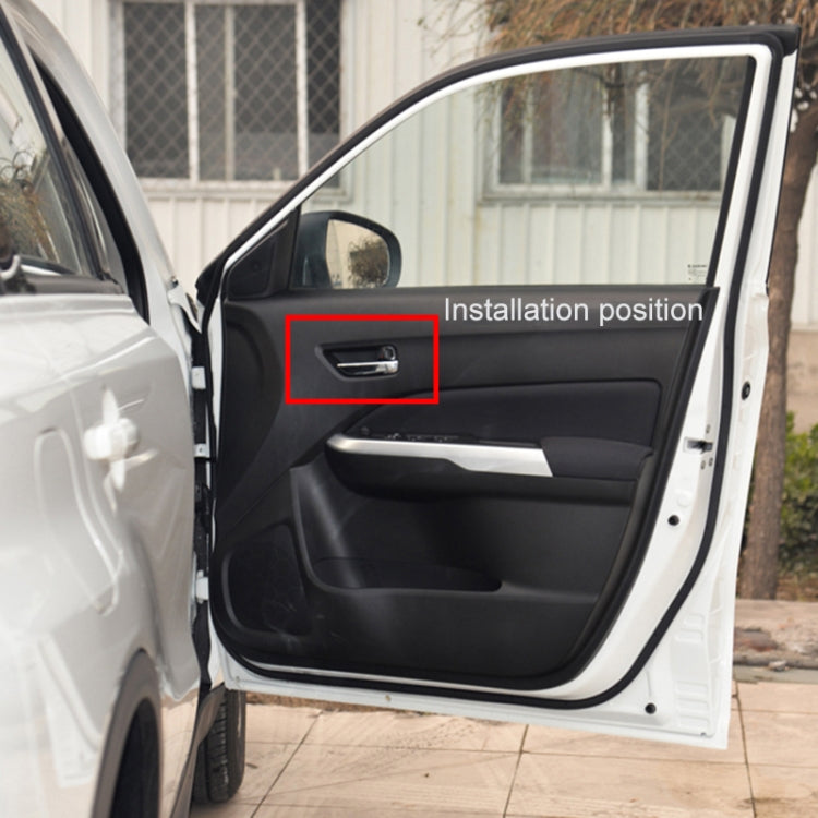 Right front inside door handle installed on car door panel, black