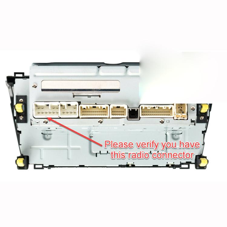 Car radio connector adapter panel showing wiring ports inside the unit housing