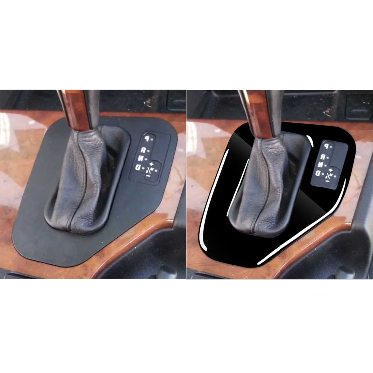 Black gear panel sticker with white trim around shifter, shown in two views