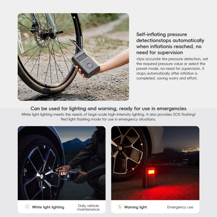 Handheld electric air pump near bicycle wheel, with compact LCD body in dark gray