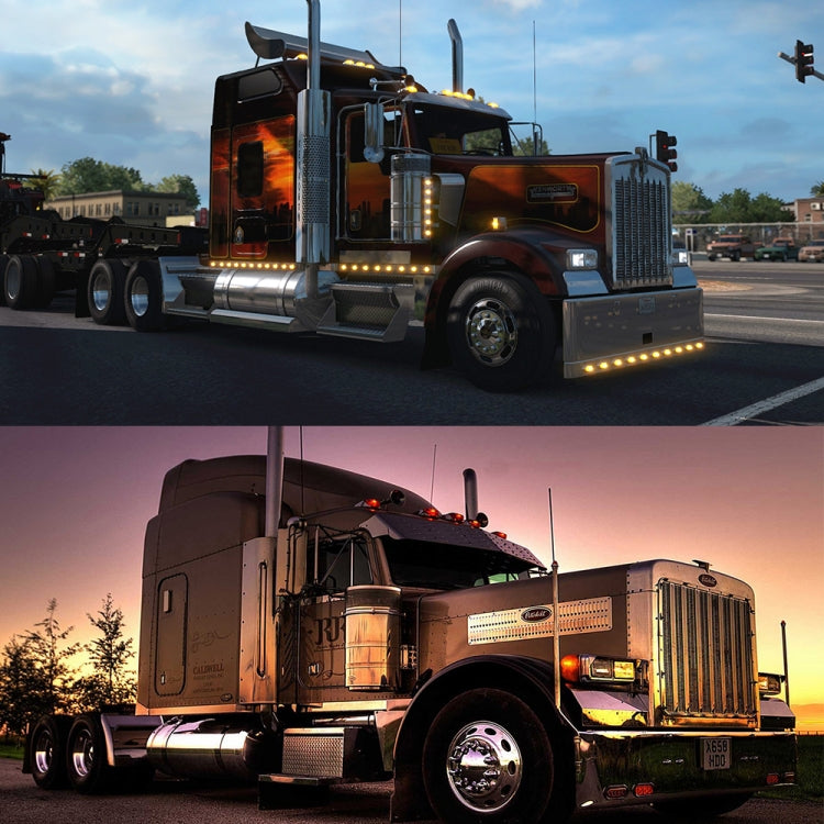 LED side marker lights glowing on a truck, black housings with red and amber lenses