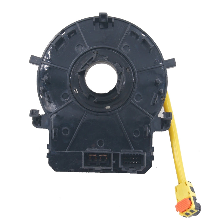 Clock spring spiral cable assembly with yellow lead and black mounting base, connector ports