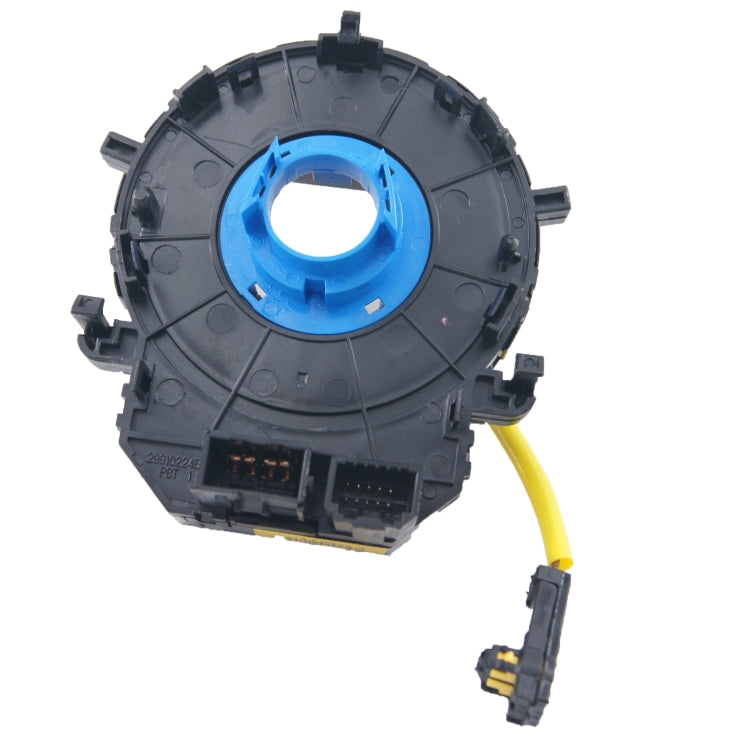 Clock spring spiral cable housing with blue center ring, yellow lead wire and multi-pin connectors