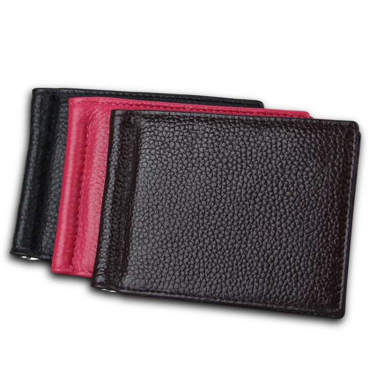 Stack of textured leather card holder wallets in magenta and dark shades
