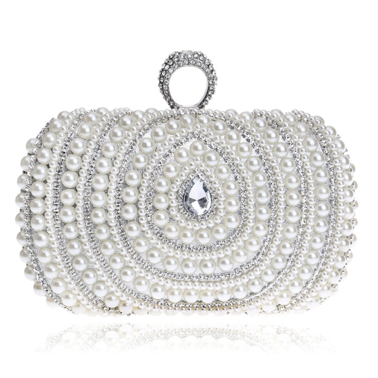 Pearl beaded clutch handbag with rhinestone handle and swirl front ornament