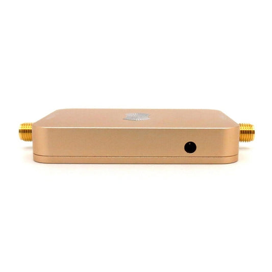 Gold wireless WiFi signal booster amplifier with side SMA connectors and front hole