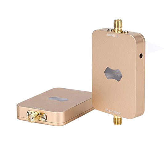 Gold wireless signal booster amplifier with antenna ports and rectangular metal body