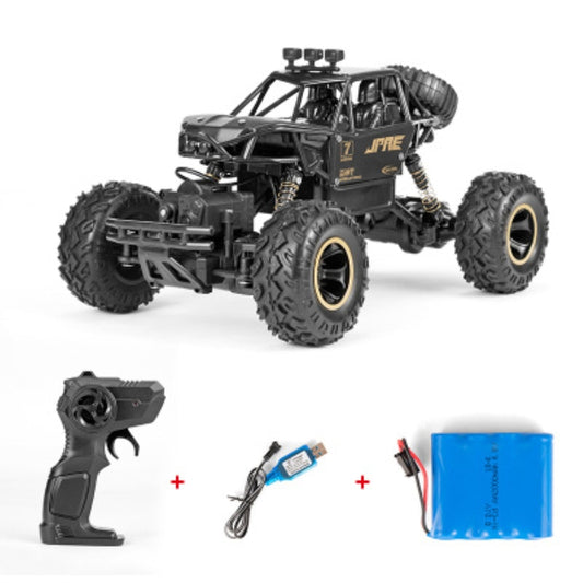 Black 1:16 remote-controlled off-road toy vehicle with oversized tread tires