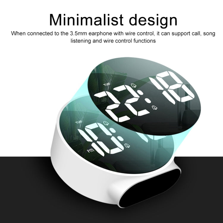 Round LED mirror alarm clock close-up with white body and glowing time digits