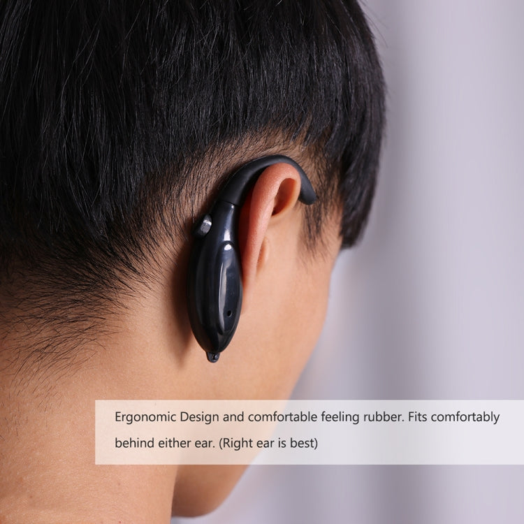 Black ergonomic ear-clip anti-sleep alarm worn behind ear, close-up side view