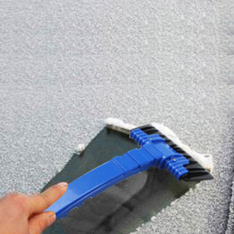Blue car ice scraper with black serrated edge, used to scrape ice from glass