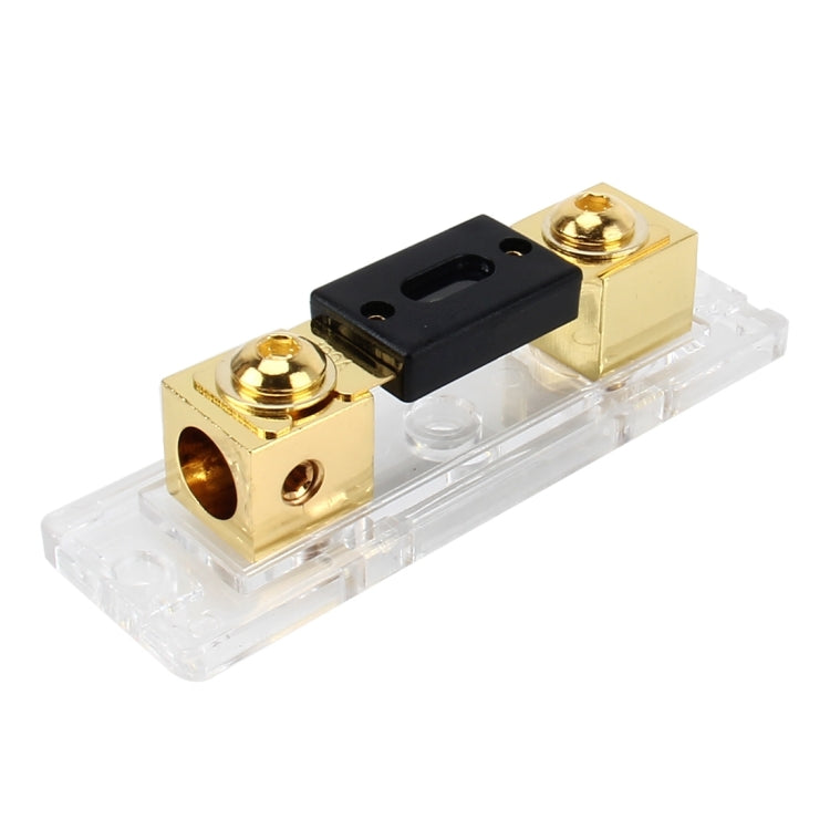 Blade fuse holder with gold block terminals and black fuse slot in clear housing