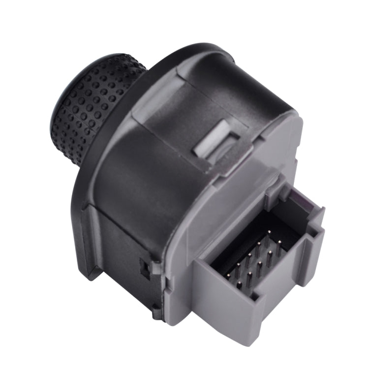 Rear mirror adjustment switch knob, side view showing textured grip and connector opening