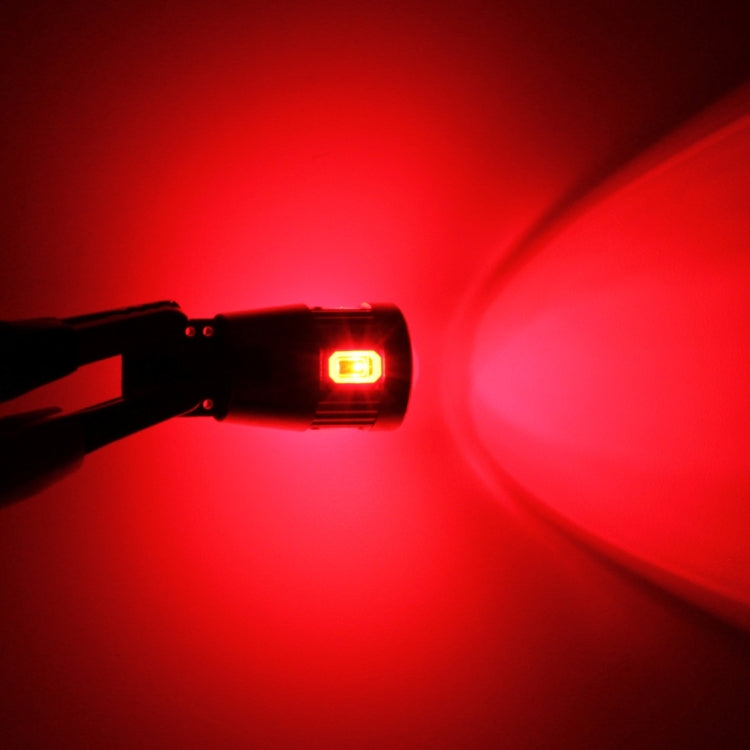 T10 LED clearance bulb glowing red in a car light application