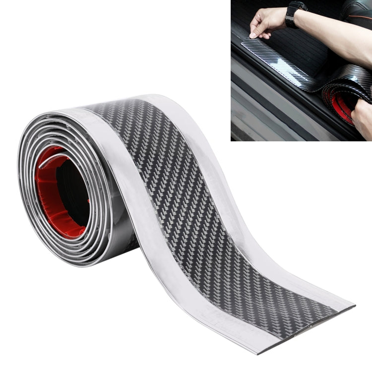Rolled carbon-fiber door threshold decoration strip with silver edge and dark weave pattern