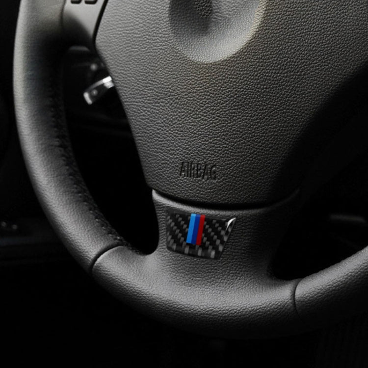 Steering wheel decorative sticker with carbon fiber look and blue/red stripe on leather
