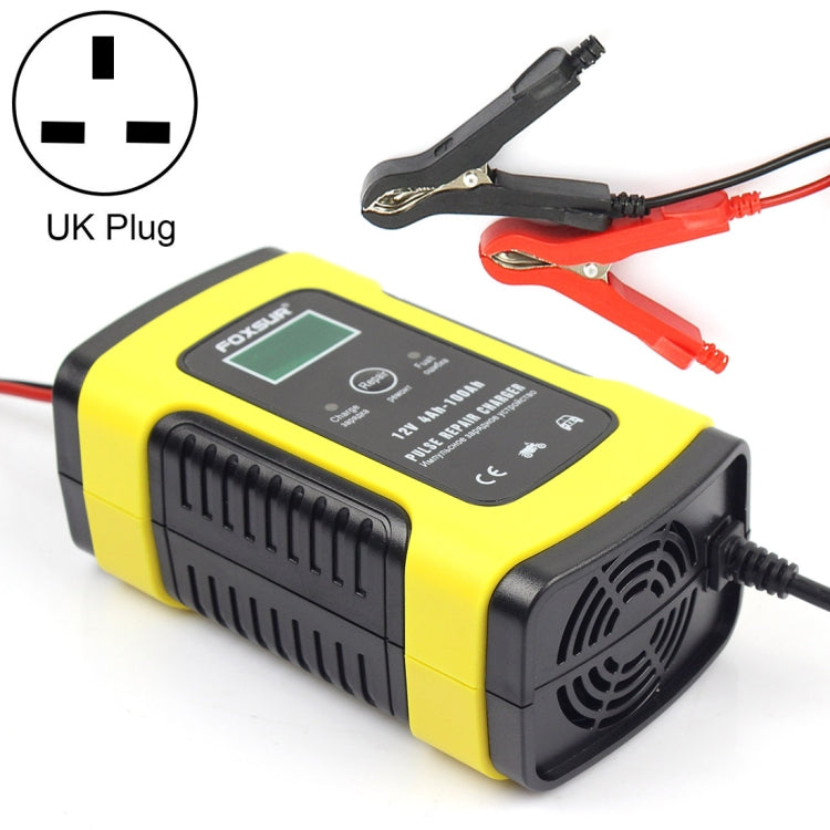 Yellow 12V battery charger with UK plug, LCD display, and red/black clamp leads