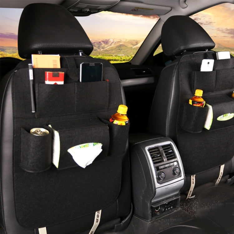 Black backseat organizer bag mounted on car seat with cup holders and small pockets
