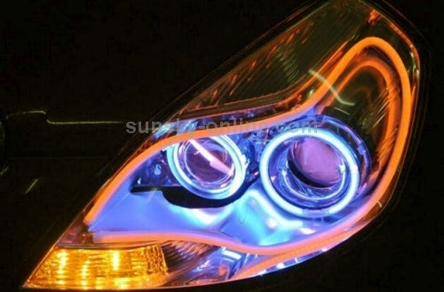 Car headlamp with blue-white DRL glow and amber turn-style ring light