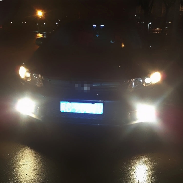 Head-on car view with bright fog lights on using H7 LED bulbs