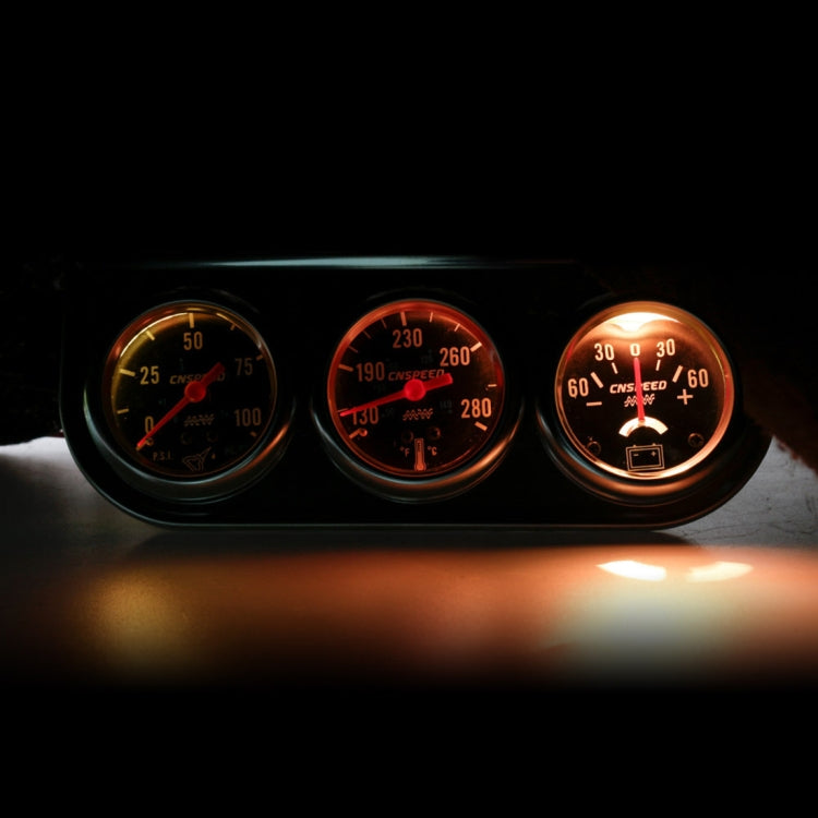 3-in-1 triple car gauge set with three orange-lit dials on dashboard