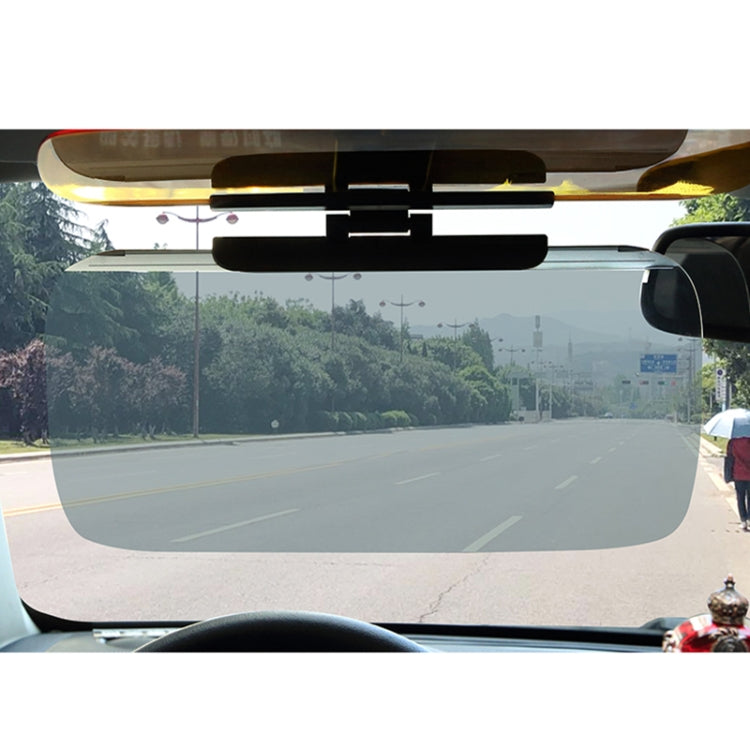Car windshield anti-glare sun visor with black bracket and gray tinted panel