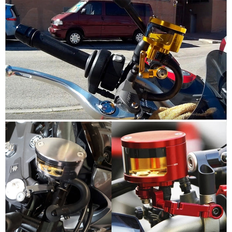 Front brake oil cup reservoir installed on a motorcycle, with gold housing and clear window