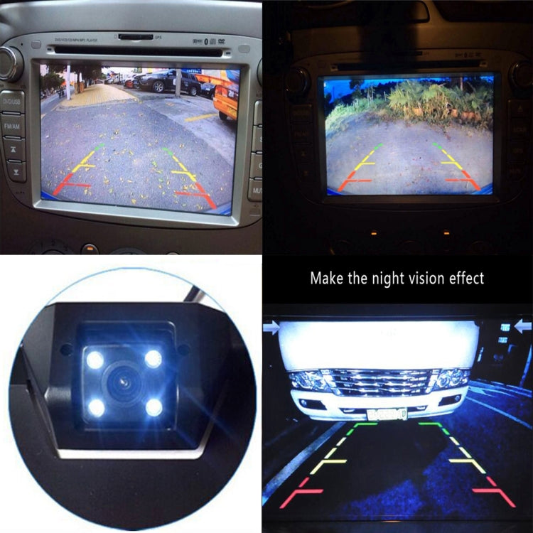 Car rear view backup camera night-vision feed on dashboard display with parking guide lines