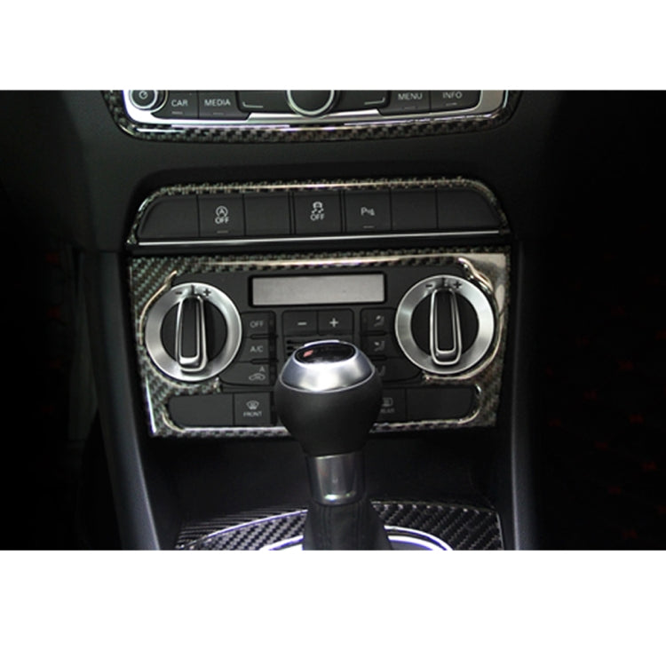 Carbon fiber AC switch panel sticker on car center console around climate controls