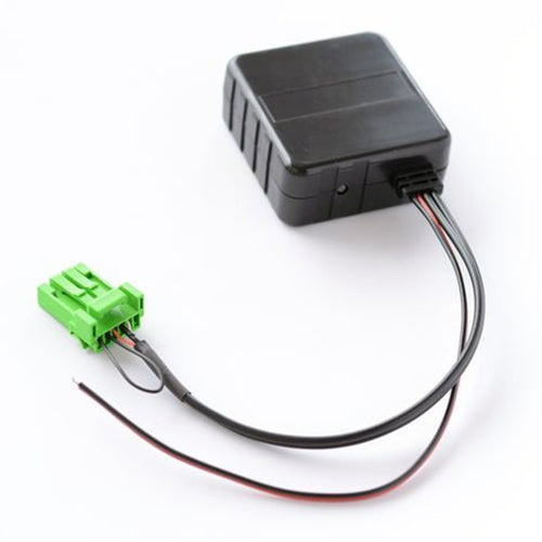 Car Bluetooth AUX adapter module with green plug and black cable leads