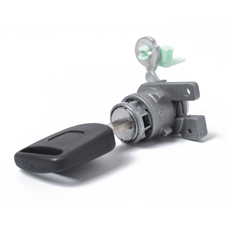 Car door lock cylinder with attached key and black plastic handle