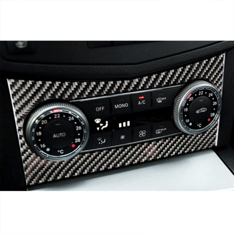 Carbon fiber air-conditioning control bezel sticker on car dashboard, wrap-around frame