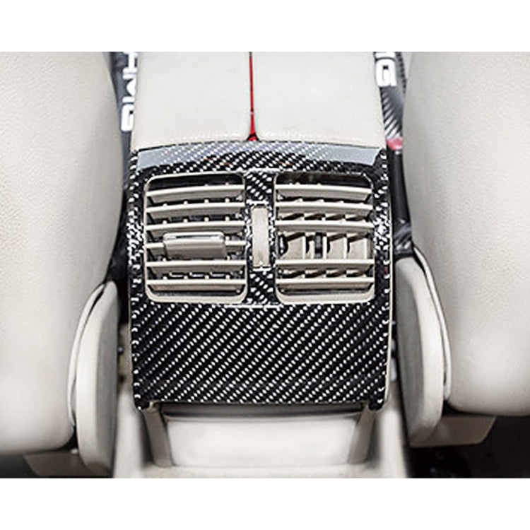 Installed carbon fiber rear air outlet frame sticker on car vent, black woven surround