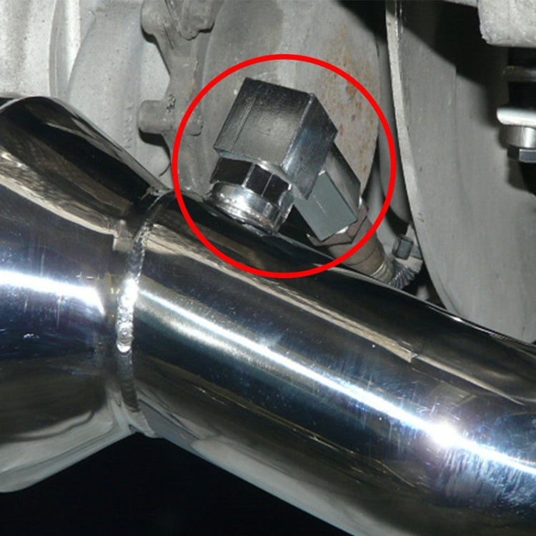 Installed 90-degree oxygen sensor spacer bung with hex head and threaded body