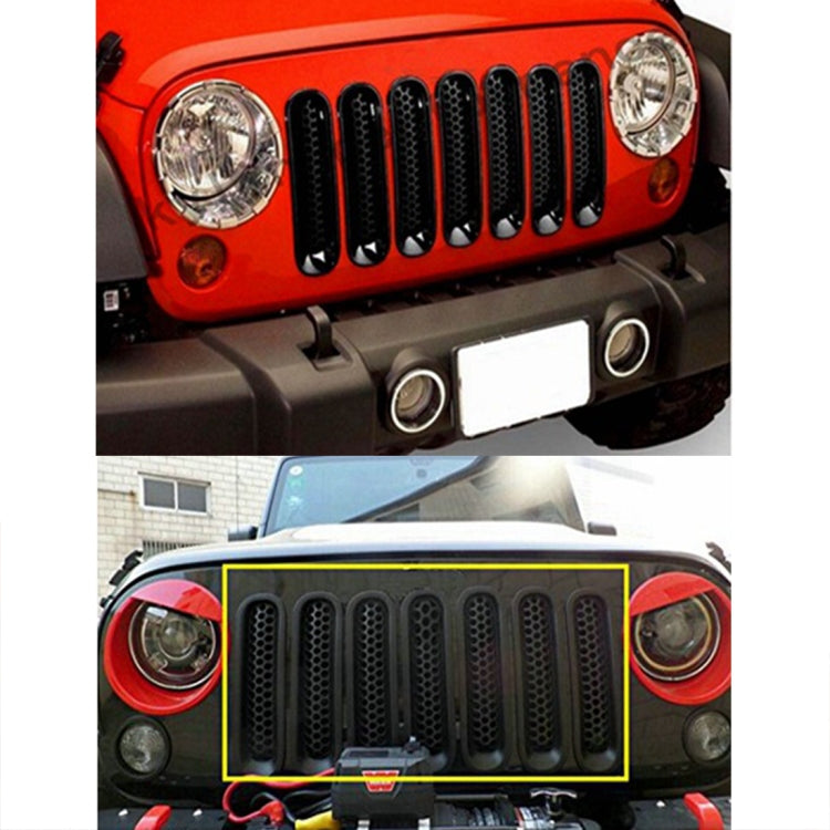 Black grille insect mesh fitted across front grille opening on Jeep Wrangler