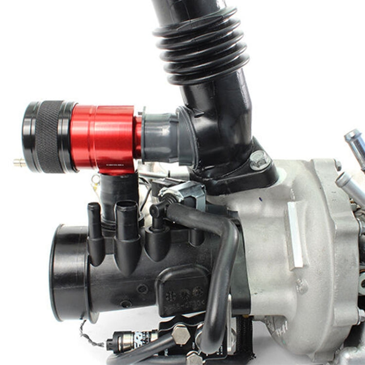 Recirculating blow-off valve installed on engine piping with red housing and black dial